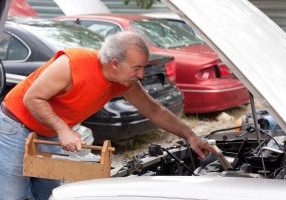 mechanic working on a car